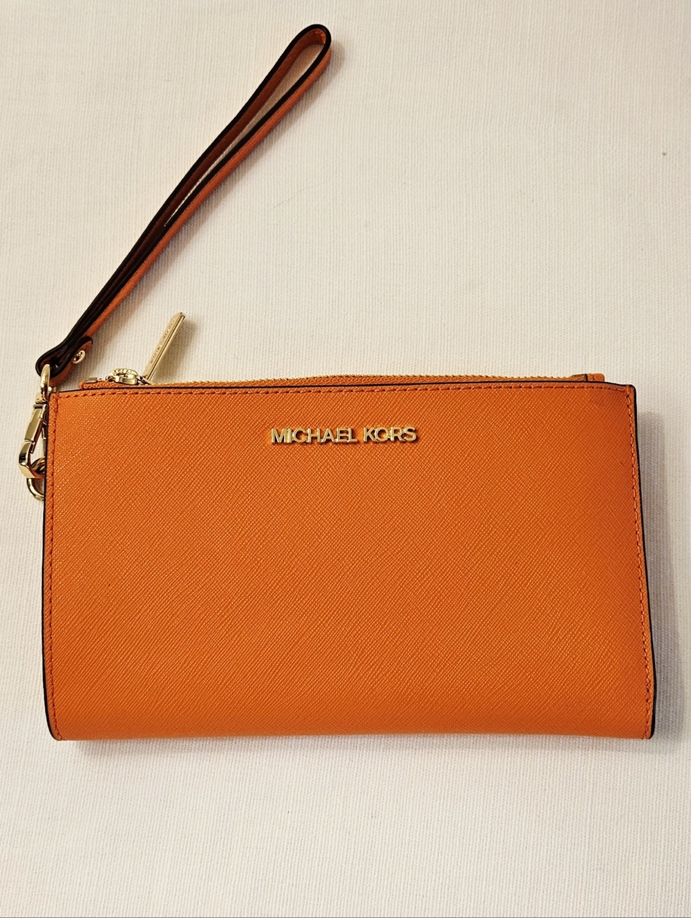 MICHAEL KORS Orange Wristlet Clutch